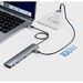 Manhattan USB-C dock/hub, poorten (7): USB-A (3×) en USB-C (4×), met Power Delivery (PD) 100 W - vereist een externe USB-C-lader (niet inbegrepen). USB-gevoed (geen externe voeding vereist) wanneer PD niet wordt gebruikt, aluminium