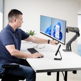 StarTech.com Dual Monitor Arm met Crossbar voor Bureau, Tot 27 inch Schermen, VESA 75x75/100x100, Max 15kg, C-klem, Volledig Scharnierend, Arm met Veermechanisme, TAA